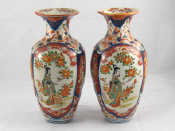 Appraisal: A pair of Imari baluster vases in traditional palette hairline