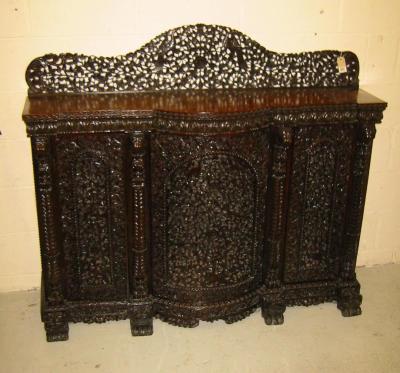 Appraisal: AN INDIAN HARDWOOD SIDE CABINET late th century of oblong