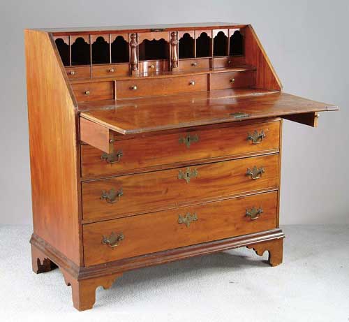 Appraisal: FOUR DRAWER MAHOGANY SLANT LID CHIPPENDALE DESK Fine figured lid