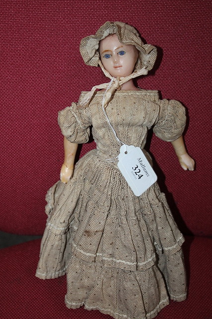 Appraisal: AN OLD WAX HEAD DOLL in Victorian type dress approximately