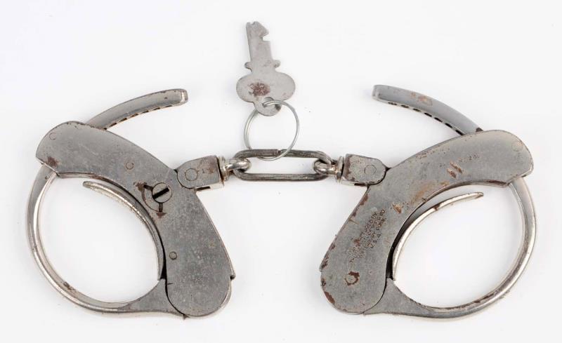 Appraisal: Maltby Flat Key Handcuffs Patent Some pitting and saw marks