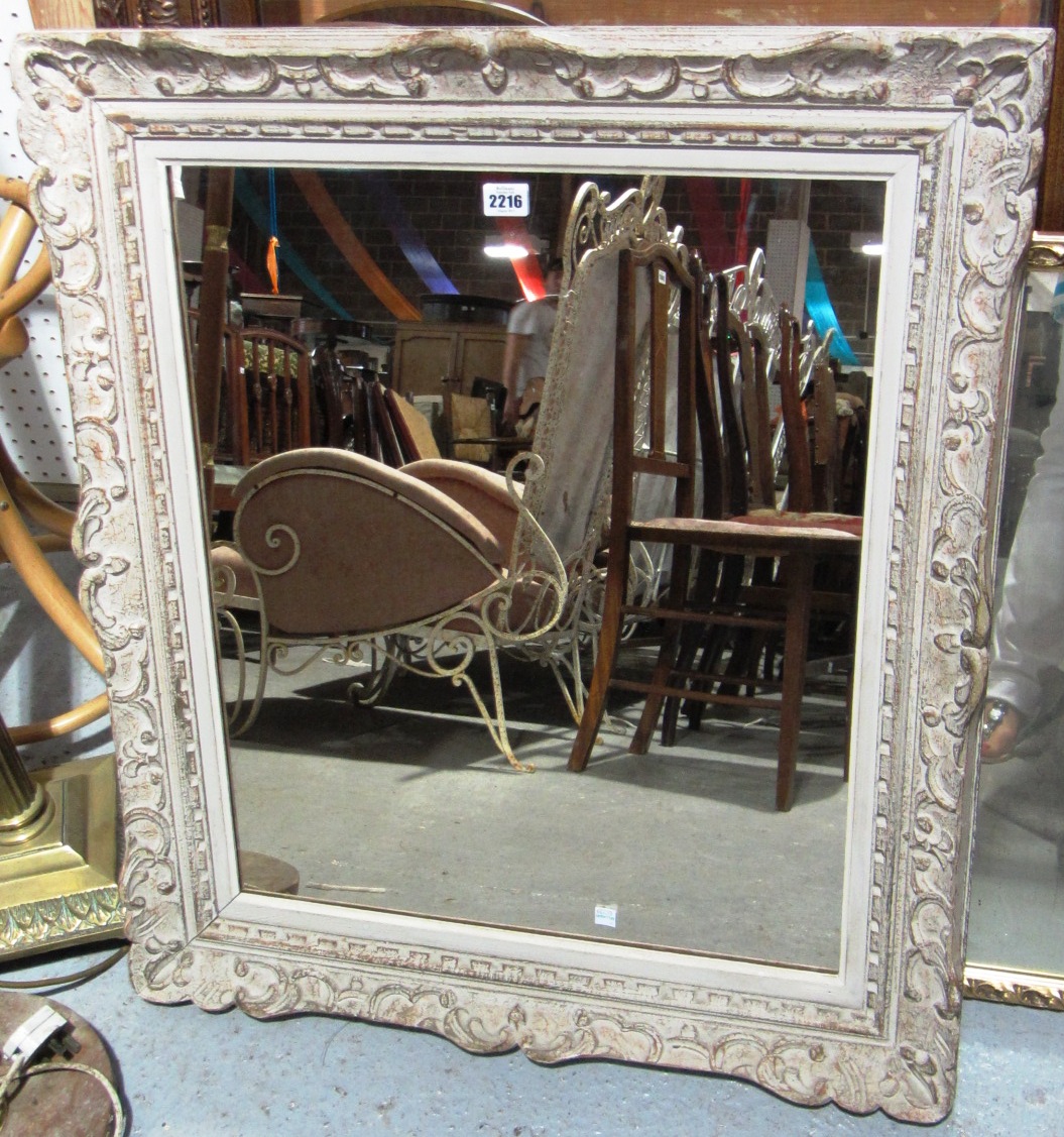 Appraisal: A th century white painted wall mirror and a circular