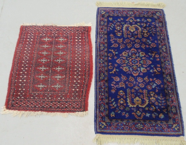 Appraisal: - Bokhara oriental mat with red field x and a