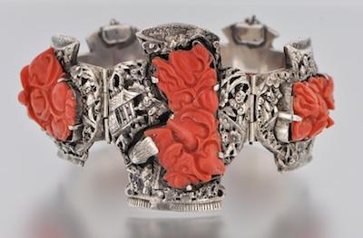 Appraisal: A Chinese Silver and Coral Bracelet Chinese silver bracelet designed