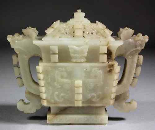 Appraisal: A Chinese pale green jade two-handled vessel and cover in