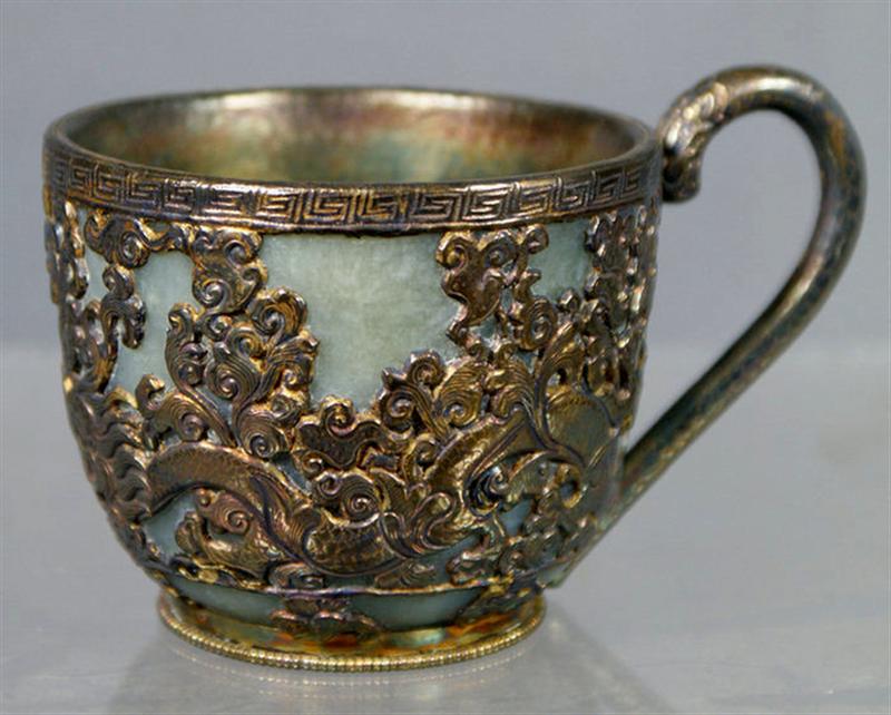 Appraisal: Engraved and pierced silver overlay on jade dragon design cup