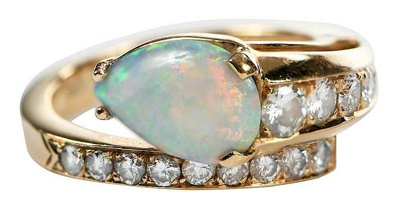 Appraisal: kt Diamond and Opal Ring one pear shaped opal cabochon