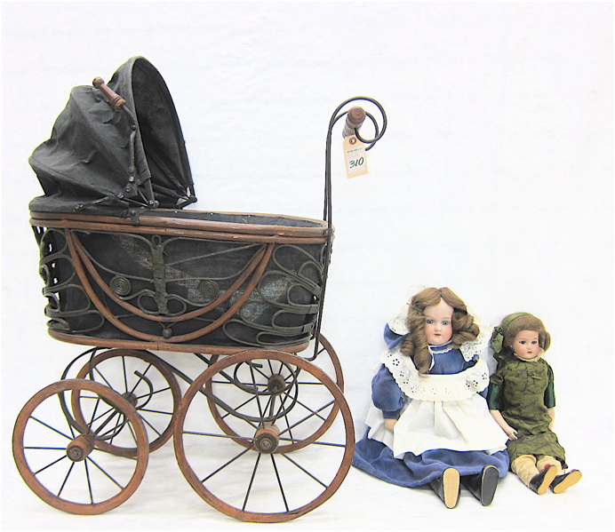 Appraisal: TWO GERMAN ANTIQUE DOLLS IN DOLL BUGGY Armand Marseille mold