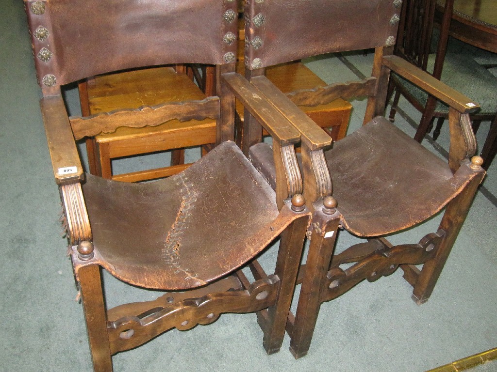 Appraisal: Pair of leather backed and seated hall chairs