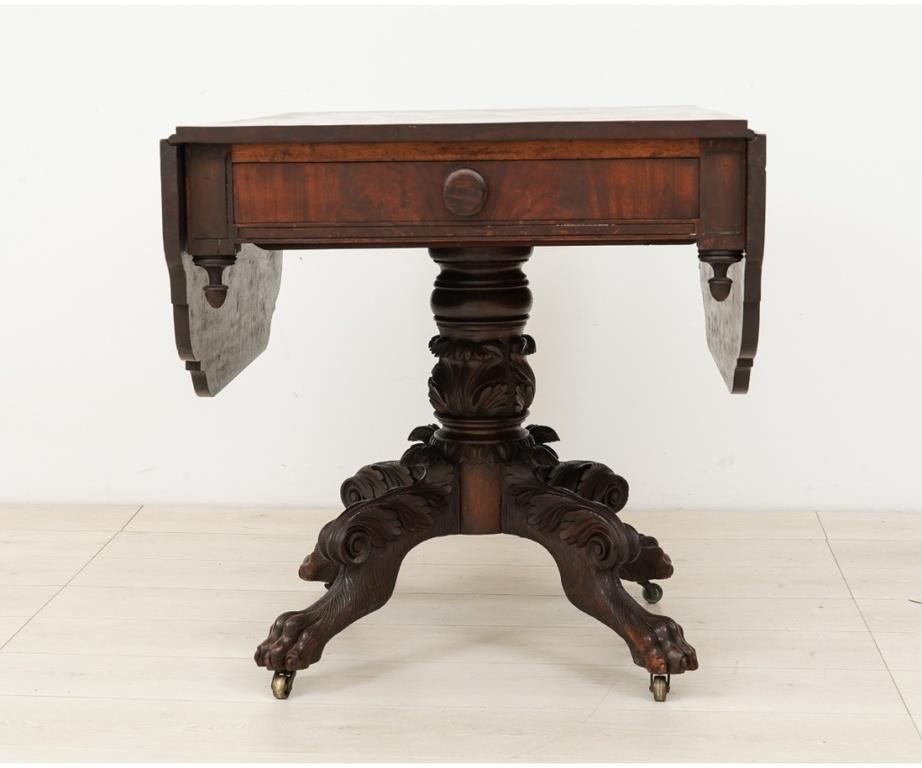 Appraisal: Mahogany Pembroke table circa with single drawer and carved paw