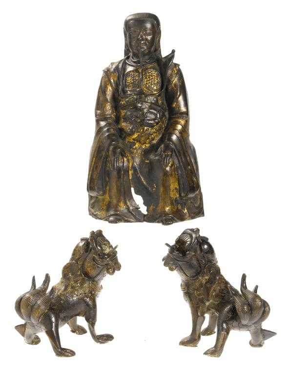 Appraisal: A GILT BRONZE FIGURE OF GUANDI MING DYNASTY modelled seated