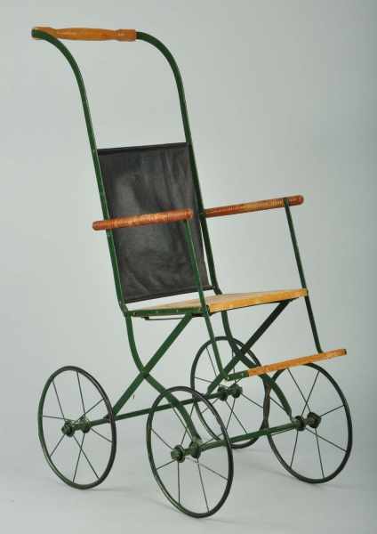 Appraisal: Antique Wood and Metal Doll Stroller Description Stenciled P M