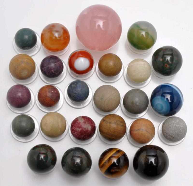 Appraisal: Lot of Stone Marbles Description Includes nine natural color limestone