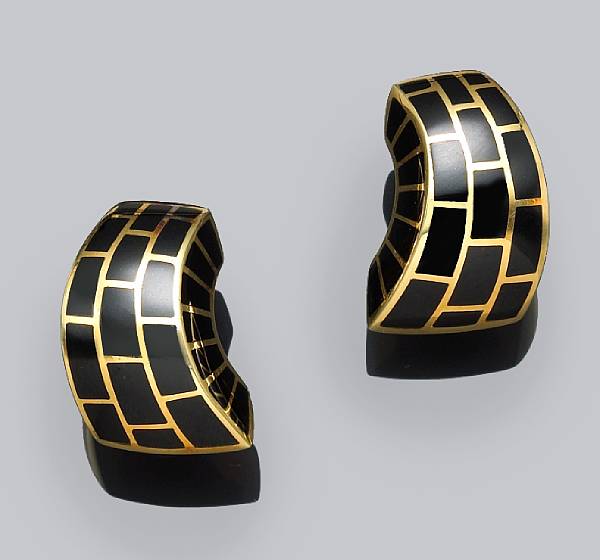 Appraisal: A pair of eighteen karat gold and black enamel earrings