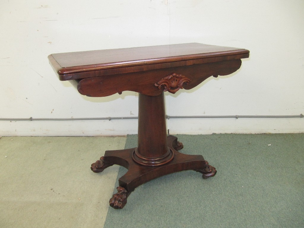 Appraisal: A William IV mahogany turnover card table raised on a