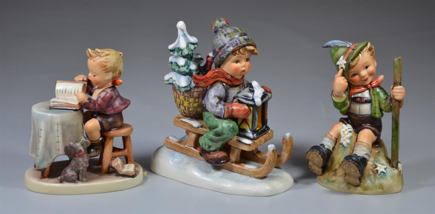 Appraisal: Goebel Hummel Figurines Little Bookkeeper slight crazing Ride into Christmas