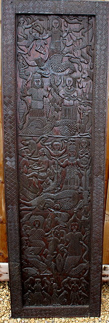 Appraisal: A NIGERIAN CARVED EBONY BENIN AFRICAN WOODEN DOOR the central