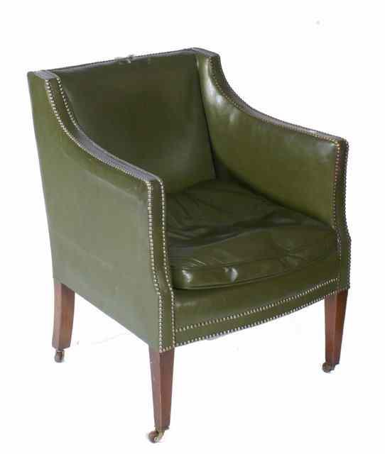 Appraisal: AN EARLY TH CENTURY ARMCHAIR on square taper supports with