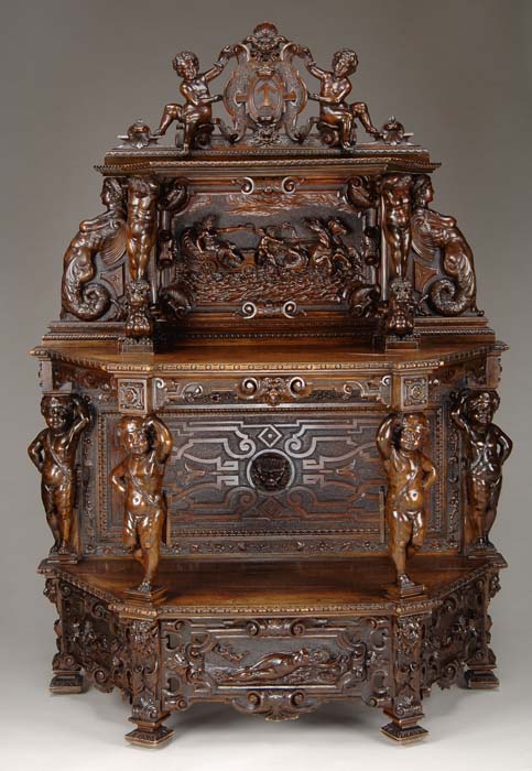 Appraisal: LAVISHLY CARVED WALNUT SIDEBOARD WITH MERMAIDS Three tier sideboard having