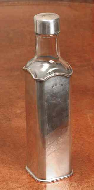 Appraisal: A SILVER SLEEVE for 'H P Sauce' with bottle and