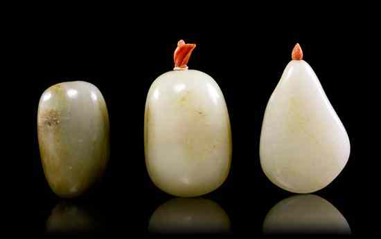 Appraisal: A Group of Three Jade Pebble Form Snuff Bottles comprising