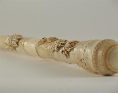 Appraisal: A Chinese telescopic fishing rod the handle constructed of carved