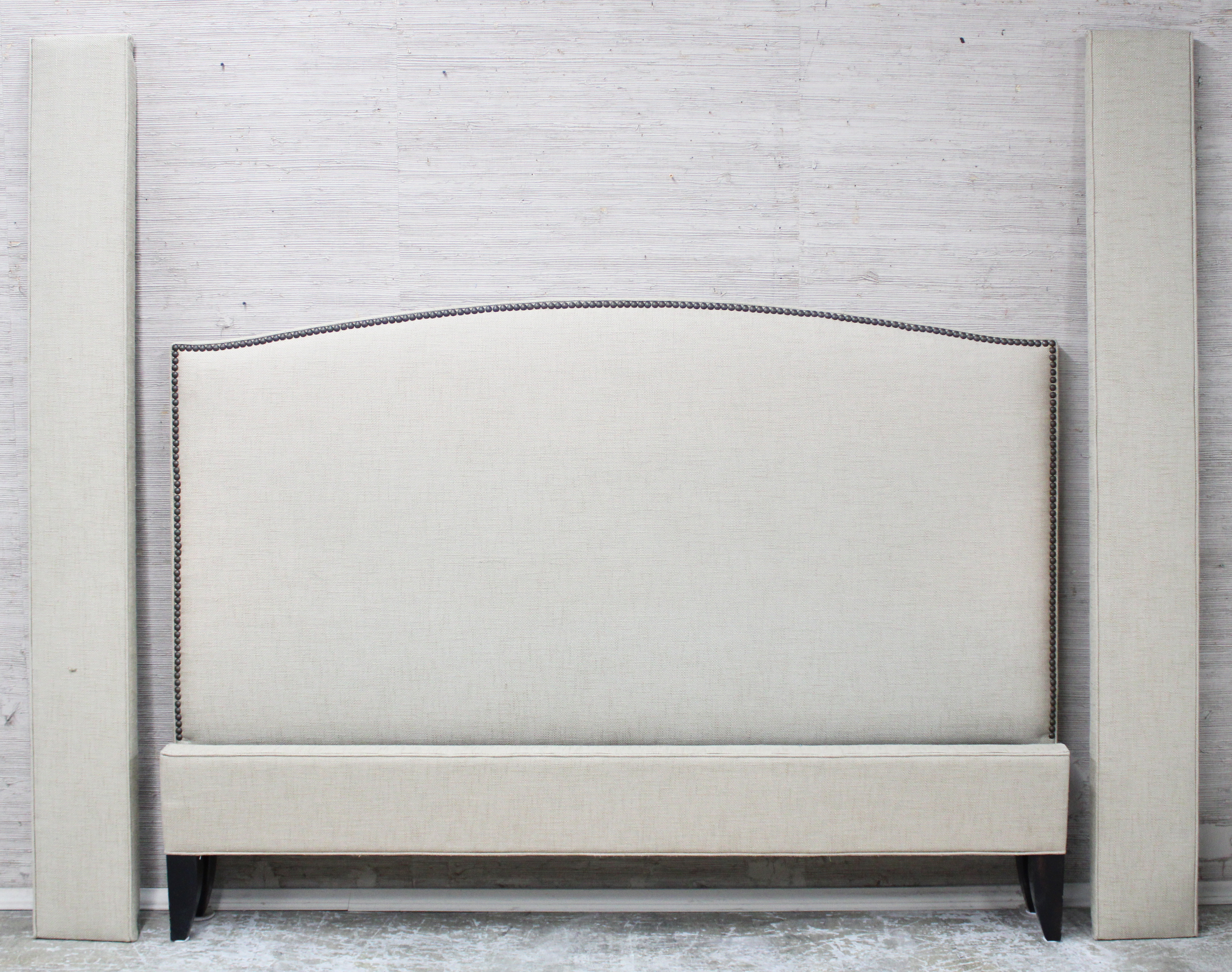 Appraisal: UPHOLSTERED AND BRASS NAIL KING BED Modern upholstered brass nailed