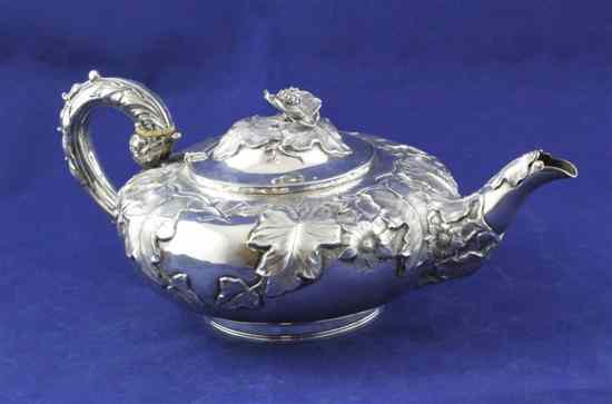 Appraisal: A George IV silver teapot of squat circular form with