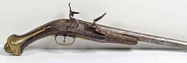 Appraisal: Mid-Eastern Flintlock Pistol bore diameter round barrel Brass furniture silver