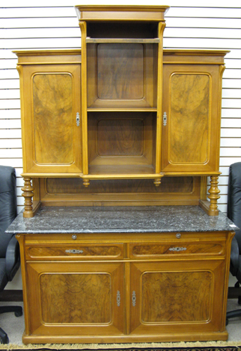 Appraisal: NINETEENTH CENTURY GERMAN SIDEBOARD the top section with open niche