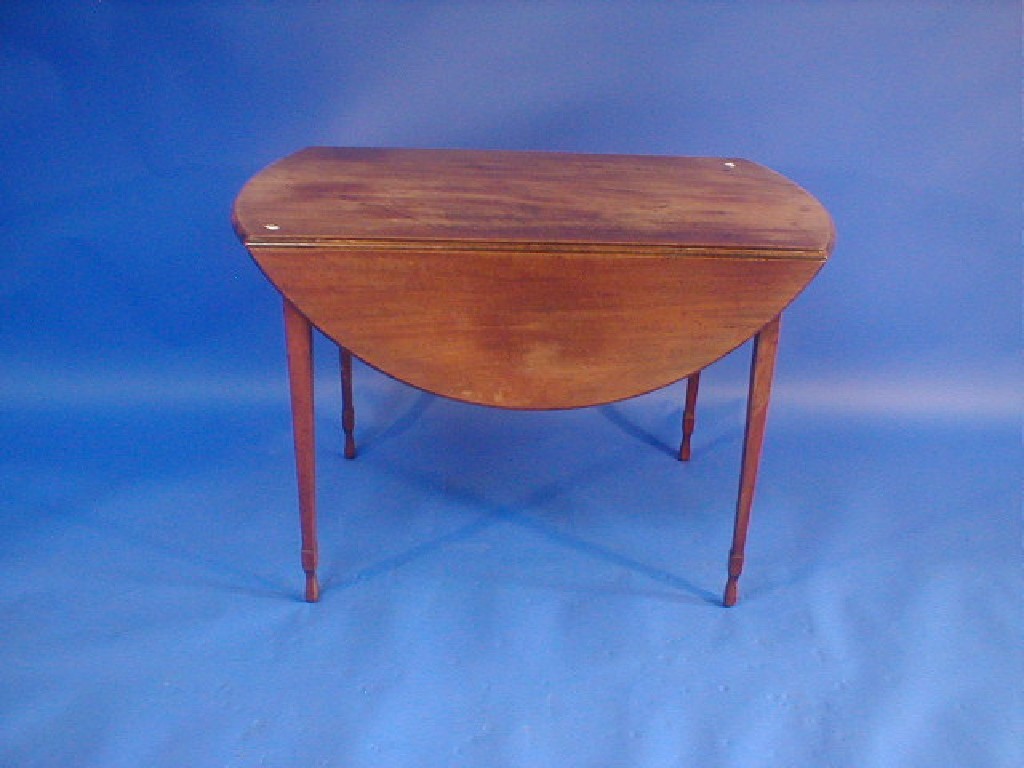 Appraisal: A thC mahogany Pembroke table with moulded oval top on