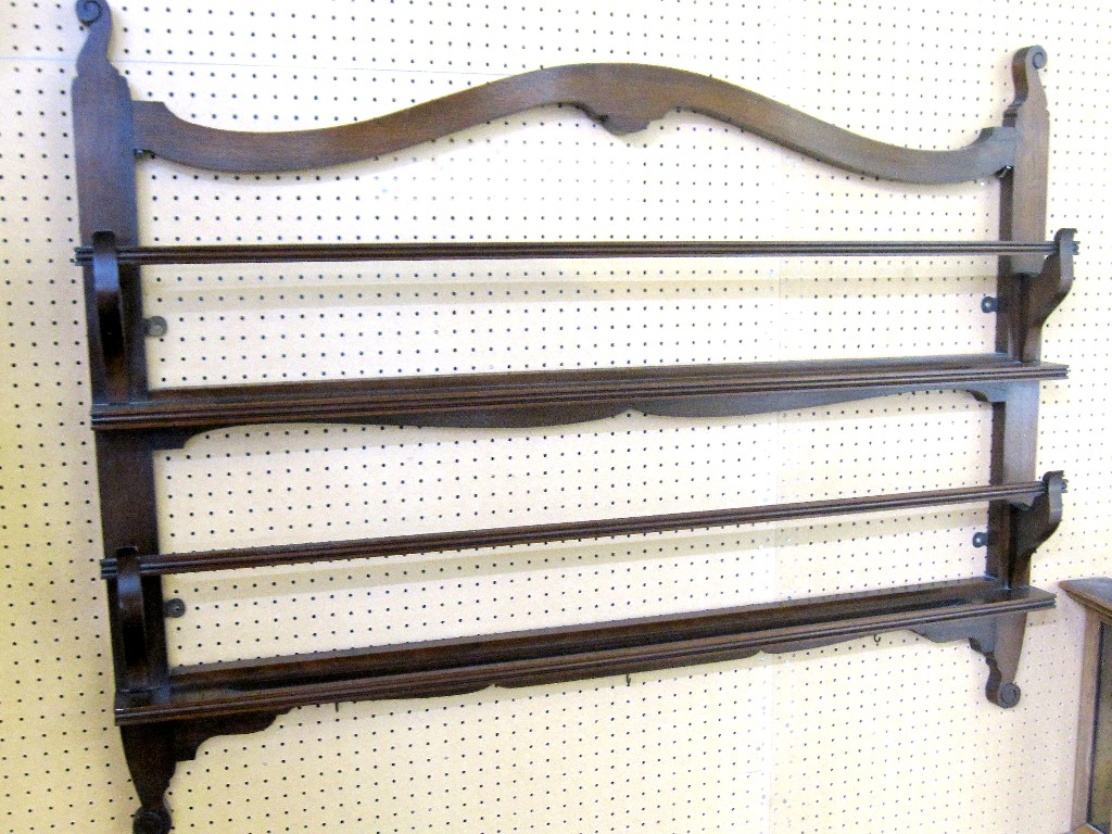 Appraisal: Mahogany wall mounted plate rack