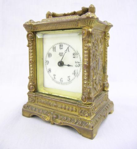 Appraisal: Ornate cast metal Waterbury Clock Company carriage clock some crazing