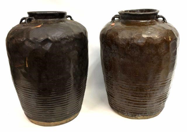 Appraisal: pair Large Chinese earthenware wine jars in dark brown glaze