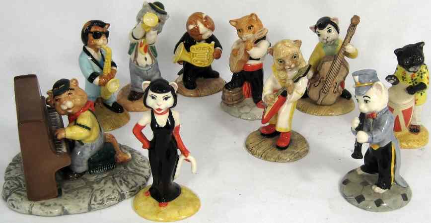 Appraisal: A set of Beswick Cats Chorus Figures Comprising Purrfect Pitch