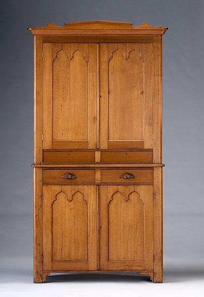 Appraisal: AMERICAN GOTHIC STEPBACK CUPBOARD ca - in walnut the pediment