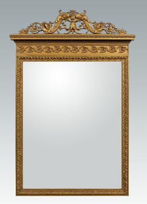 Appraisal: Renaissance style mirror pediment with dolphins and bellflowers above detailed