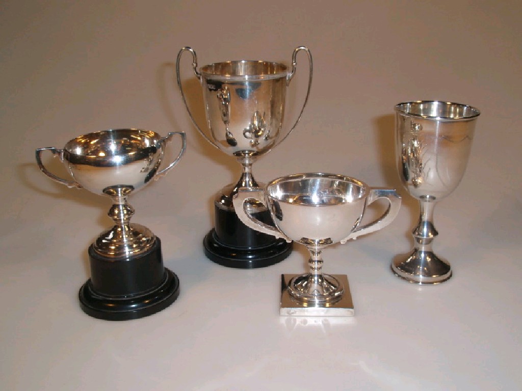 Appraisal: Three George V silver two-handled Trophy Cups another example engraved