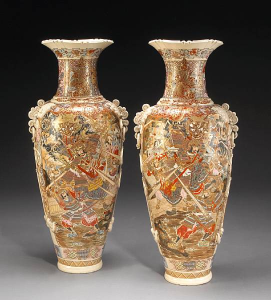 Appraisal: A pair of massive Satsuma style polychrome and gilt enameled