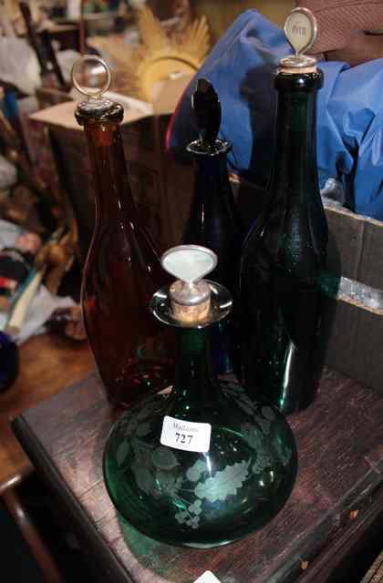 Appraisal: A POSSIBLY TH CENTURY GREEN GLASS DECANTER with engraved thistle