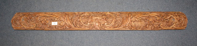 Appraisal: AN ANTIQUE CARVED PINE RECTANGULAR PANEL with acanthus cartouche decoration