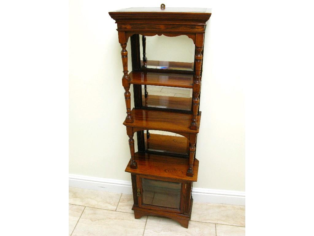 Appraisal: A late Victorian rosewood Etargere with bevelled mirror panel backs