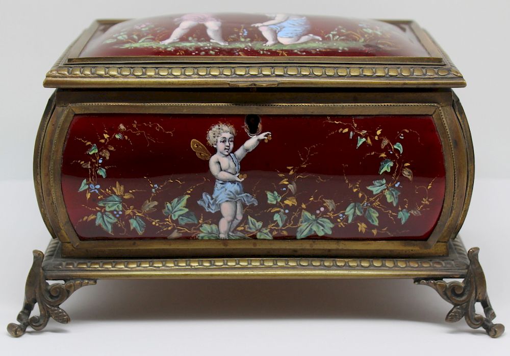 Appraisal: Enamel Decorated Jewelry Casket Box Rich ruby red panels of