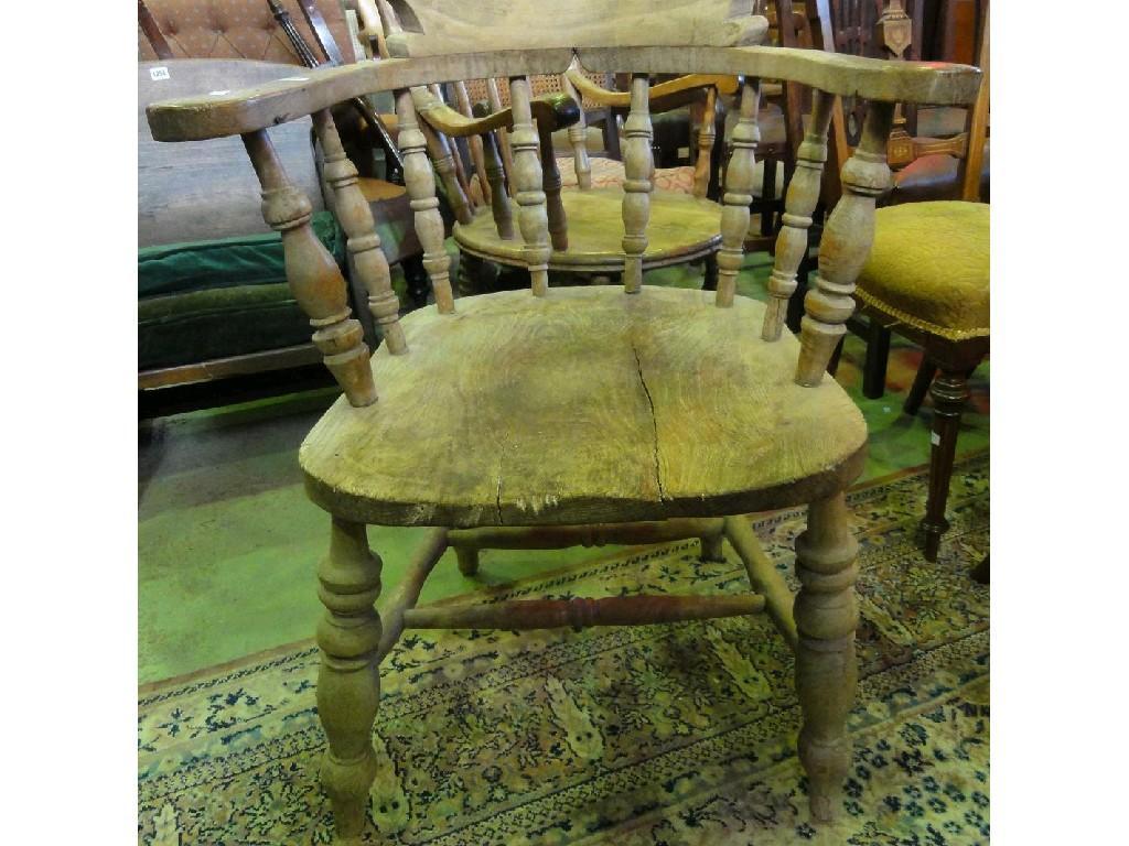 Appraisal: A Victorian elm and beech wood smokers bow chair with