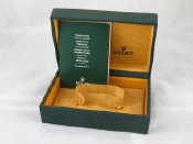 Appraisal: A fitted Rolex watch box with a certification booklet