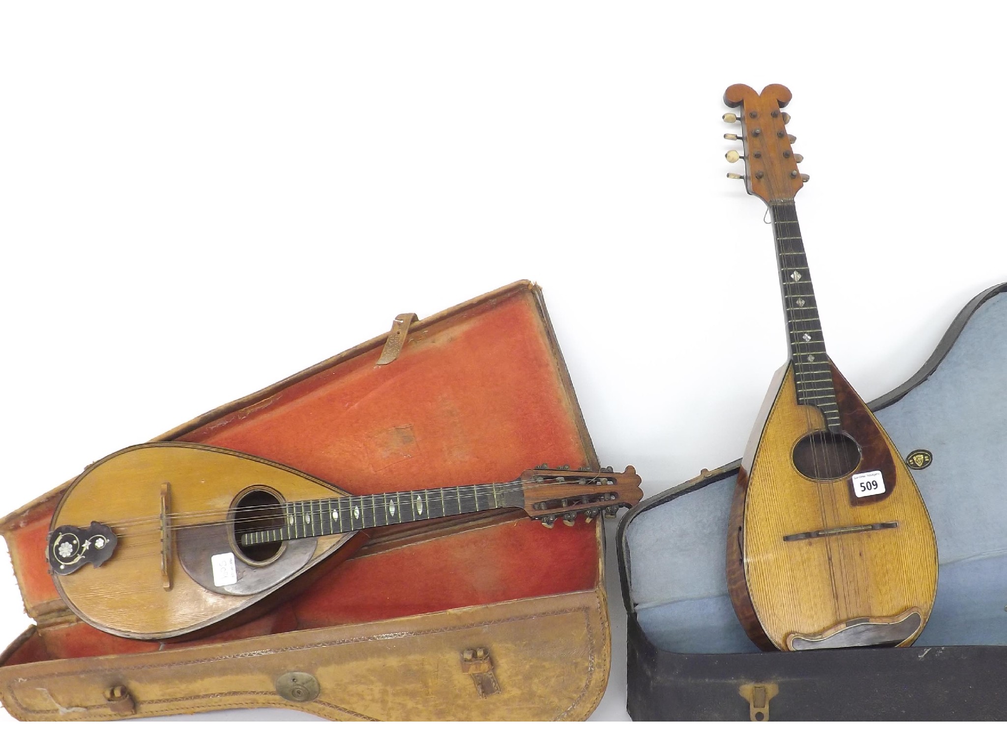 Appraisal: Two similar pear shaped mandolins both cased