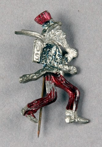 Appraisal: Uncle Sam Marching to War stick pin painted metal tall