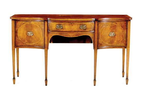 Appraisal: English inlaid mahogany serpentine sideboard circa shaped top over case