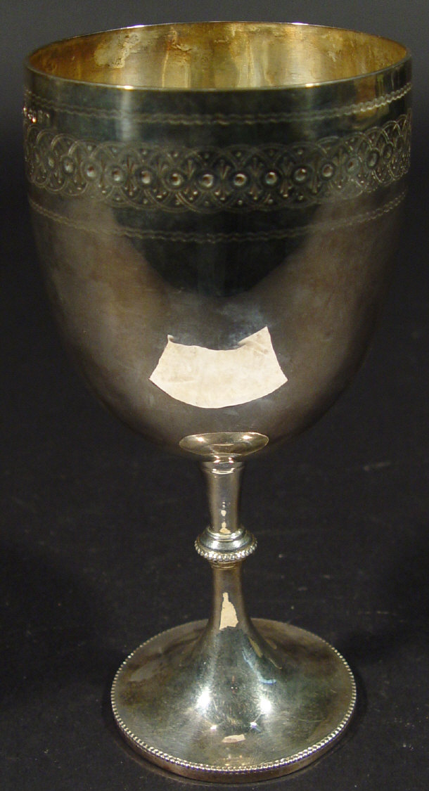 Appraisal: Victorian silver goblet with a band of engraved decoration London