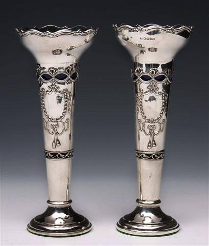 Appraisal: A PAIR OF EDWARDIAN SILVER POSY VASES pierced and pressed